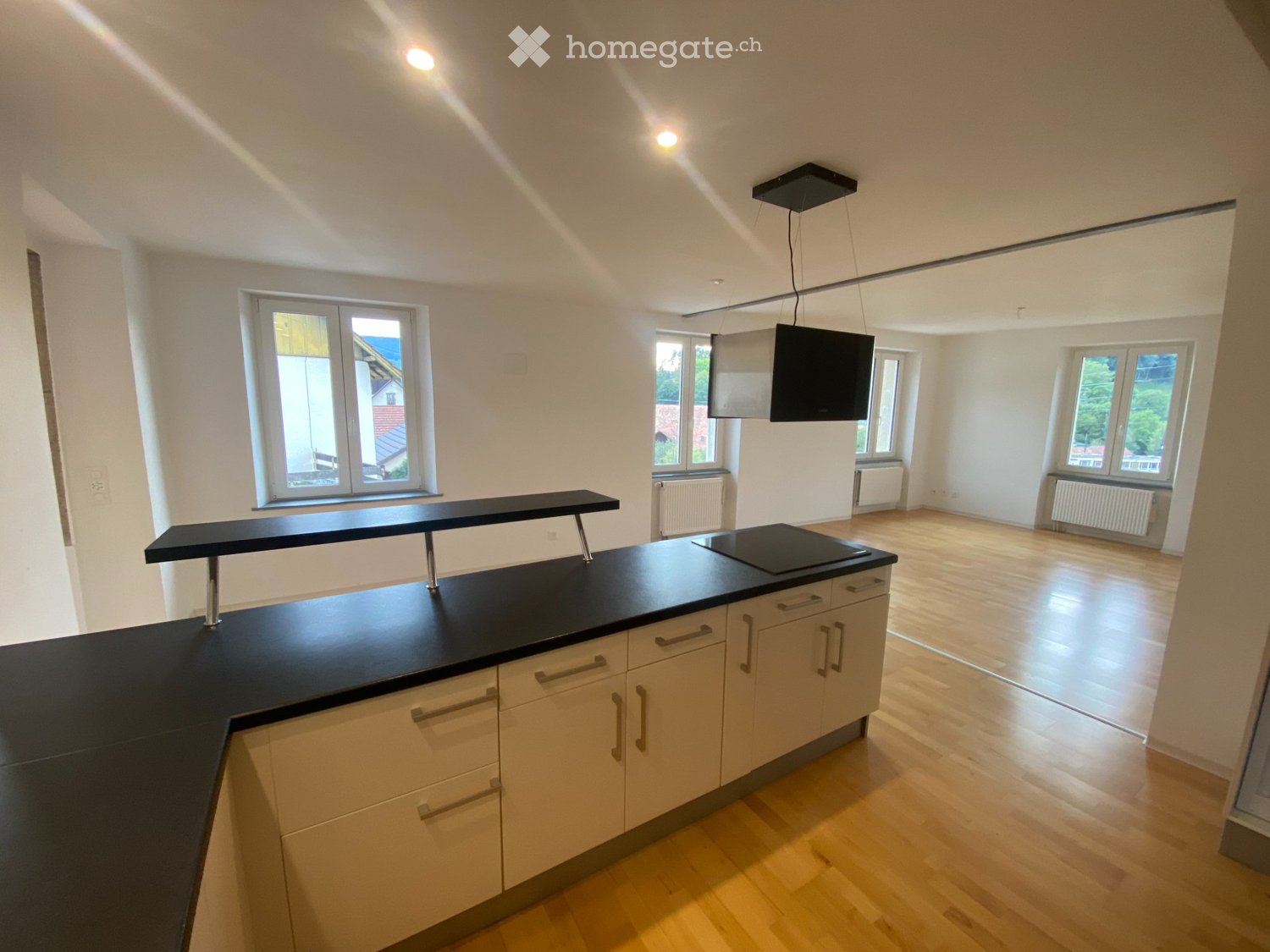 4 rooms apartment

Apartment on the 1st floor with large terrace for rent in Fontenais.   
  
Bathroom with Italian shower and bathtub, toilet area, kitchen open to living room, 2 bedrooms, one partially closed room.   
  
Washing machine and dryer in the apartment.   
  
Parking space available.   